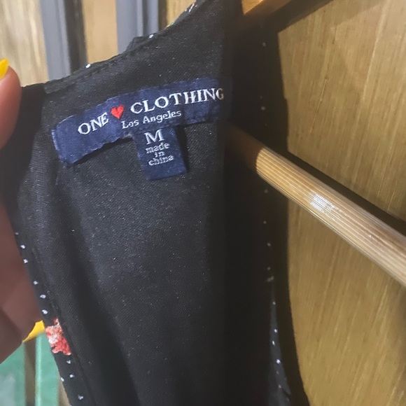 Black floral jumpsuit with white polkadots. Worn a handful of times. - Picture 4 of 4